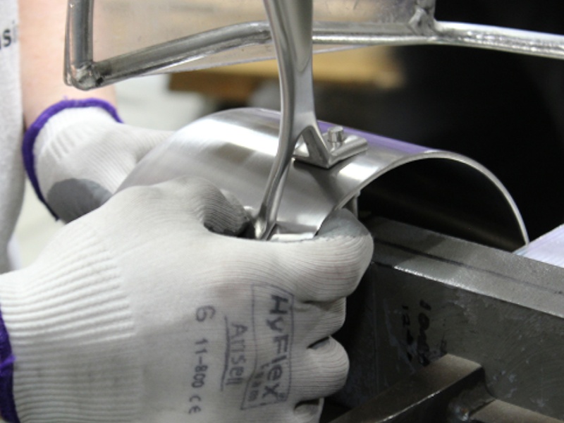 Inspecting stainless steel pot for ISO standards